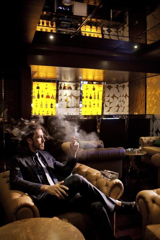 The Domain Bahrain Hotel And Spa - Adults Friendly 16 Years Plus Manama Dış mekan fotoğraf A man smoking in a nightclub