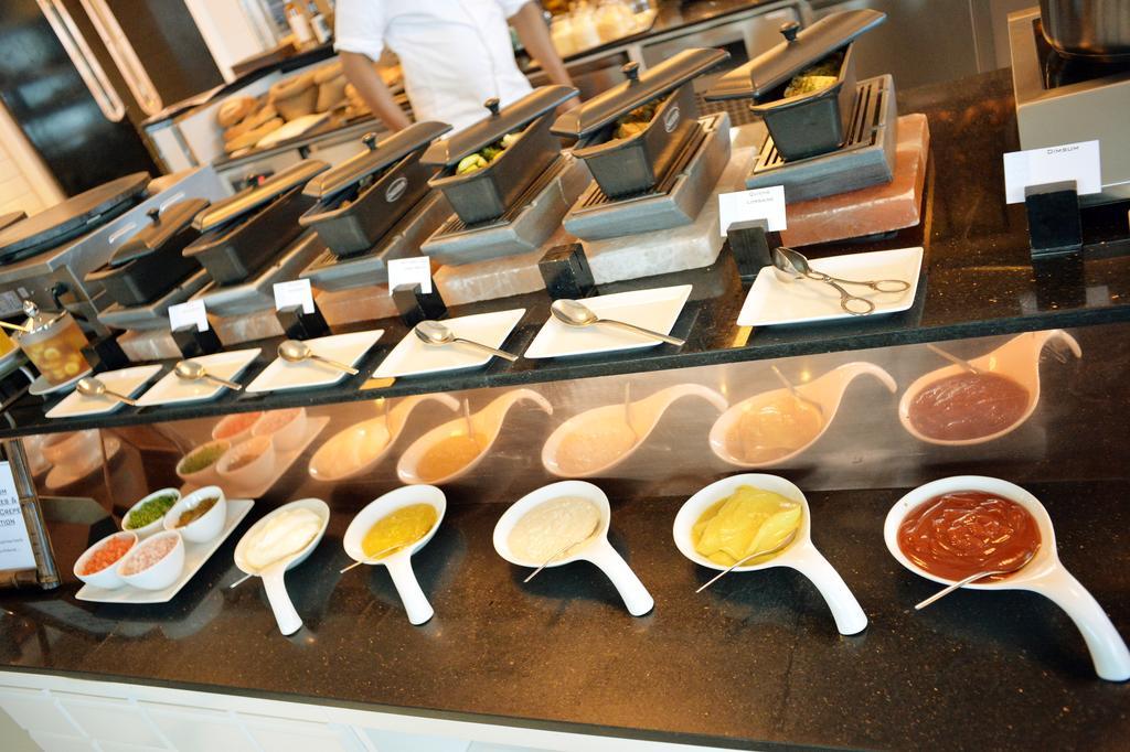 The Domain Bahrain Hotel And Spa - Adults Friendly 16 Years Plus Manama Dış mekan fotoğraf A selection of sauces